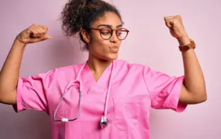 Nurse wearing pink scrubs showing of her nursing strengths and weaknesses