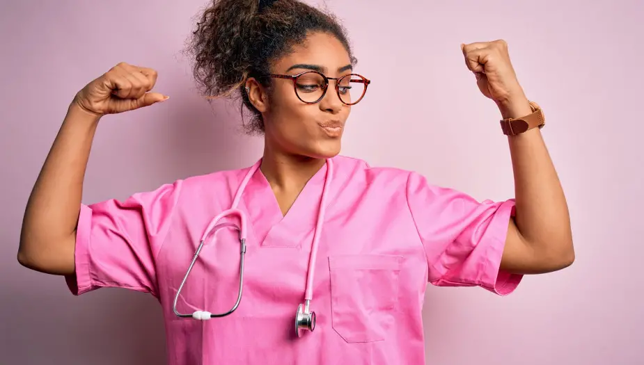 Nurse wearing pink scrubs showing of her nursing strengths and weaknesses
