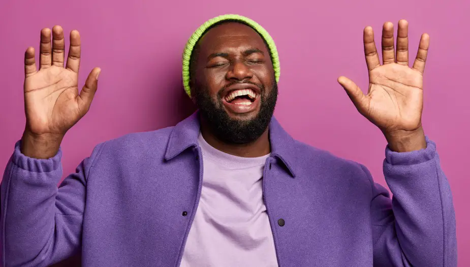 Man in purple excited about his ENFP strengths