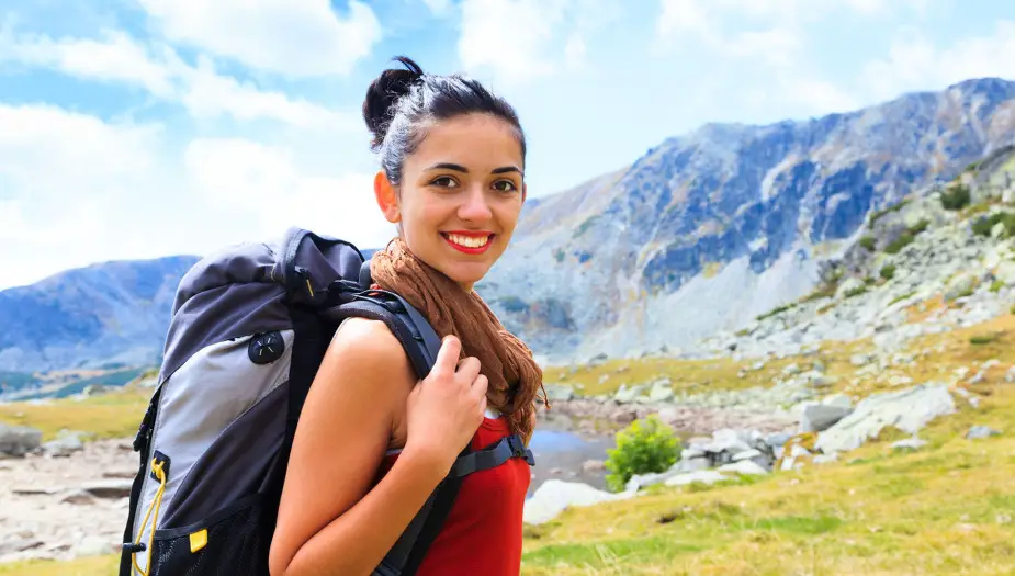 woman with a long list of ISFP weaknesses by mountains